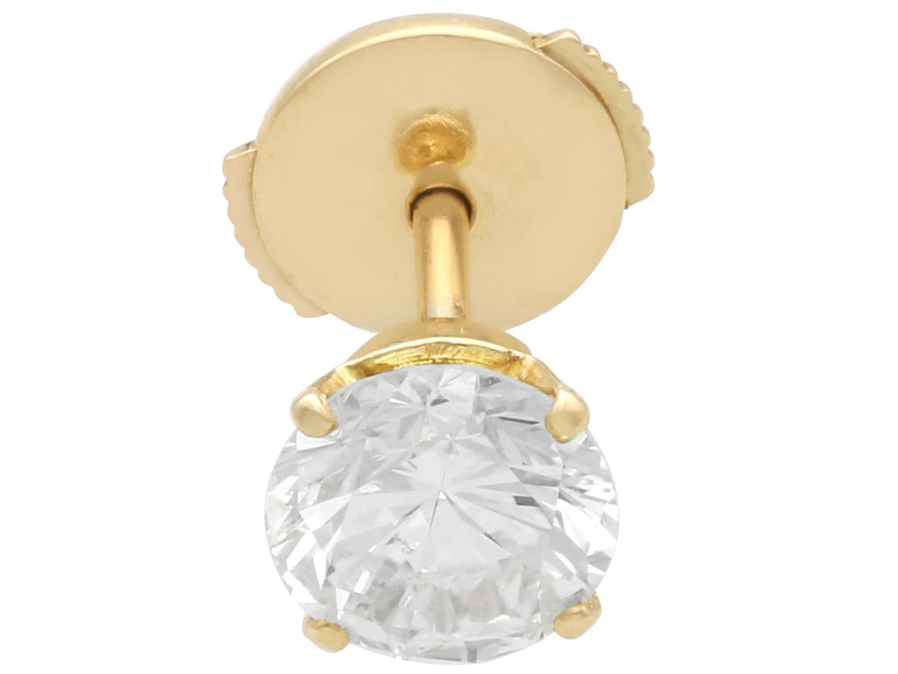 A stunning, fine and impressive pair of vintage 2.01 carat diamond and 18 karat yellow gold stud earrings; part of our vintage jewelry and estate jewelry collections.

These impressive vintage stud earrings have been crafted in 18k yellow gold.

The