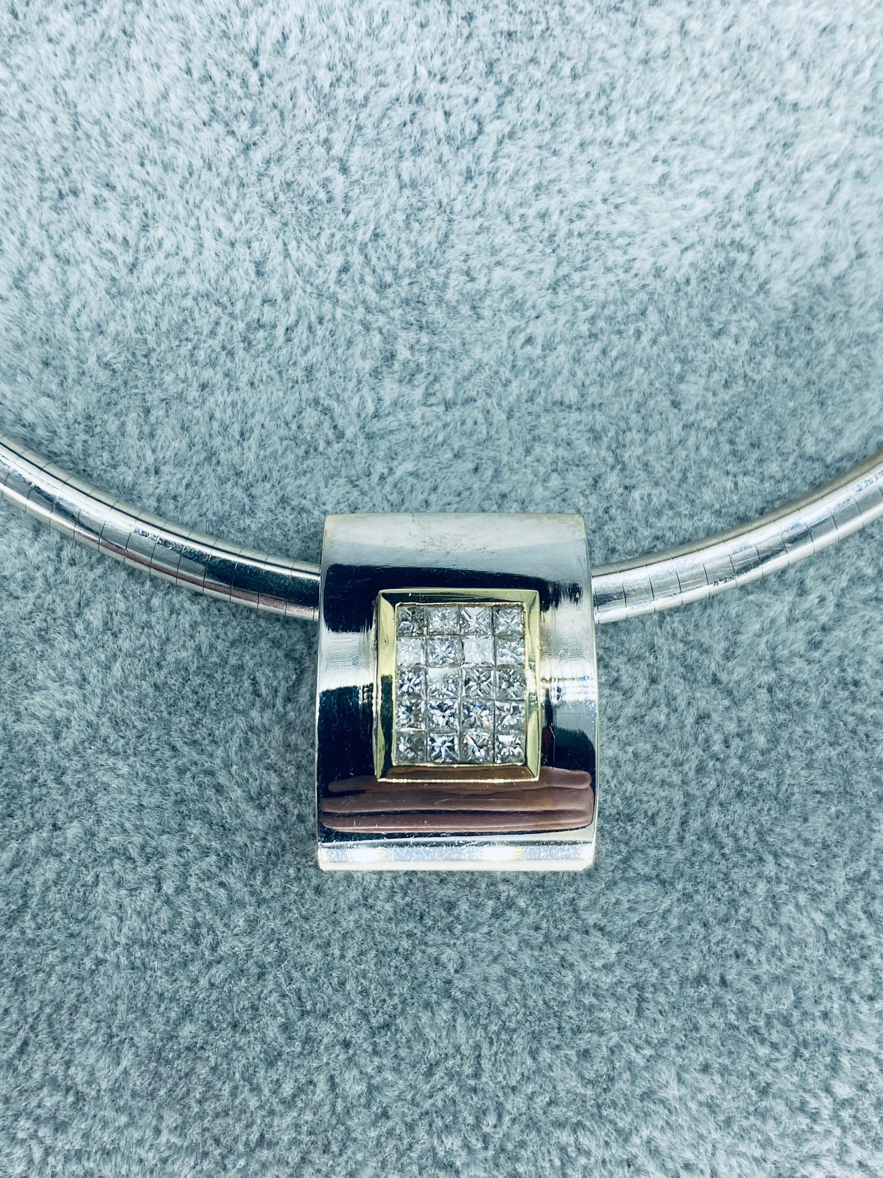 Vintage 2.03 Carat Diamonds Pendant With RARE Omega 17 Inch Chain 18k White Gold.
There are approx 20 princess cut diamonds in the pendant crafted in white gold with a yellow gold frame around the diamonds in 18k gold. The chain is heavy weighting