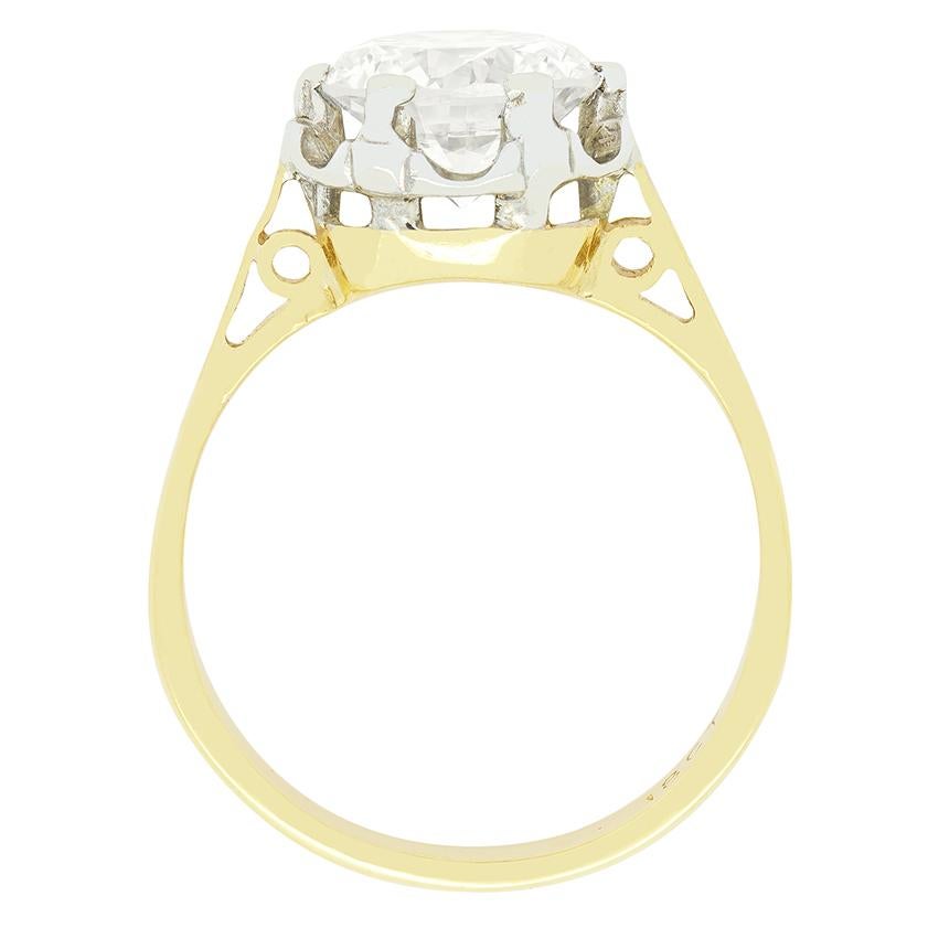 This timeless solitaire dates back to the 1950s. A 2.04 carat round brilliant diamond takes centre stage, claw set into an 18 carat white gold collet. The sparkling diamond has a colour of between I and J and a clarity of VS1. A contrasting band of
