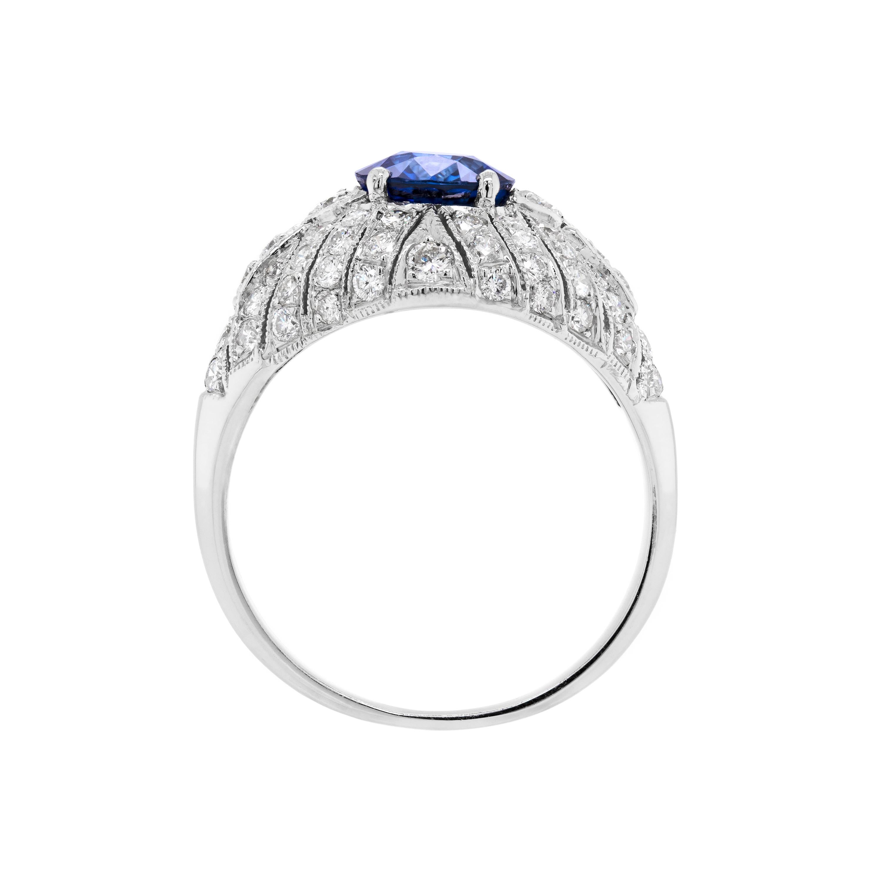 Oval Cut Vintage 2.06 Carat Oval Sapphire and Diamond Cluster Platinum Engagement Ring