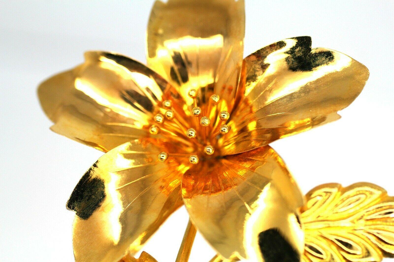 gold flower brooches