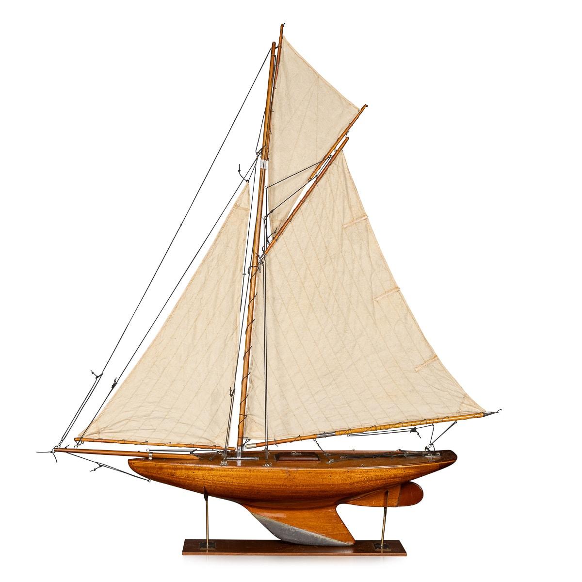 A fantastic Gaff Cutter pond yacht, lovely “bread and butter“ wood hull construction dating to the first part of the 20th Century. Bread and butter construction is when planks of wood are stacked on top of each other (the bread) and then stuck