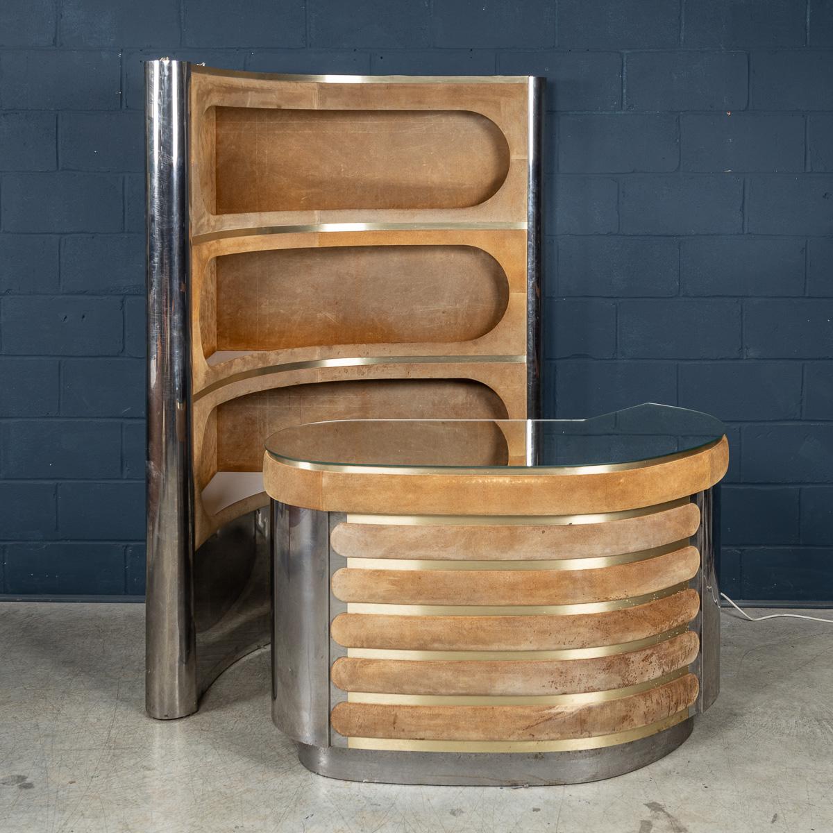 A stunning vintage cocktail bar finished in alcantara leather and steel, designed and engineered by Willy Rizzo in the 1970s. His glamorous bars are amongst the most sought after objects from his work. The example on offer was realised in the 1970s