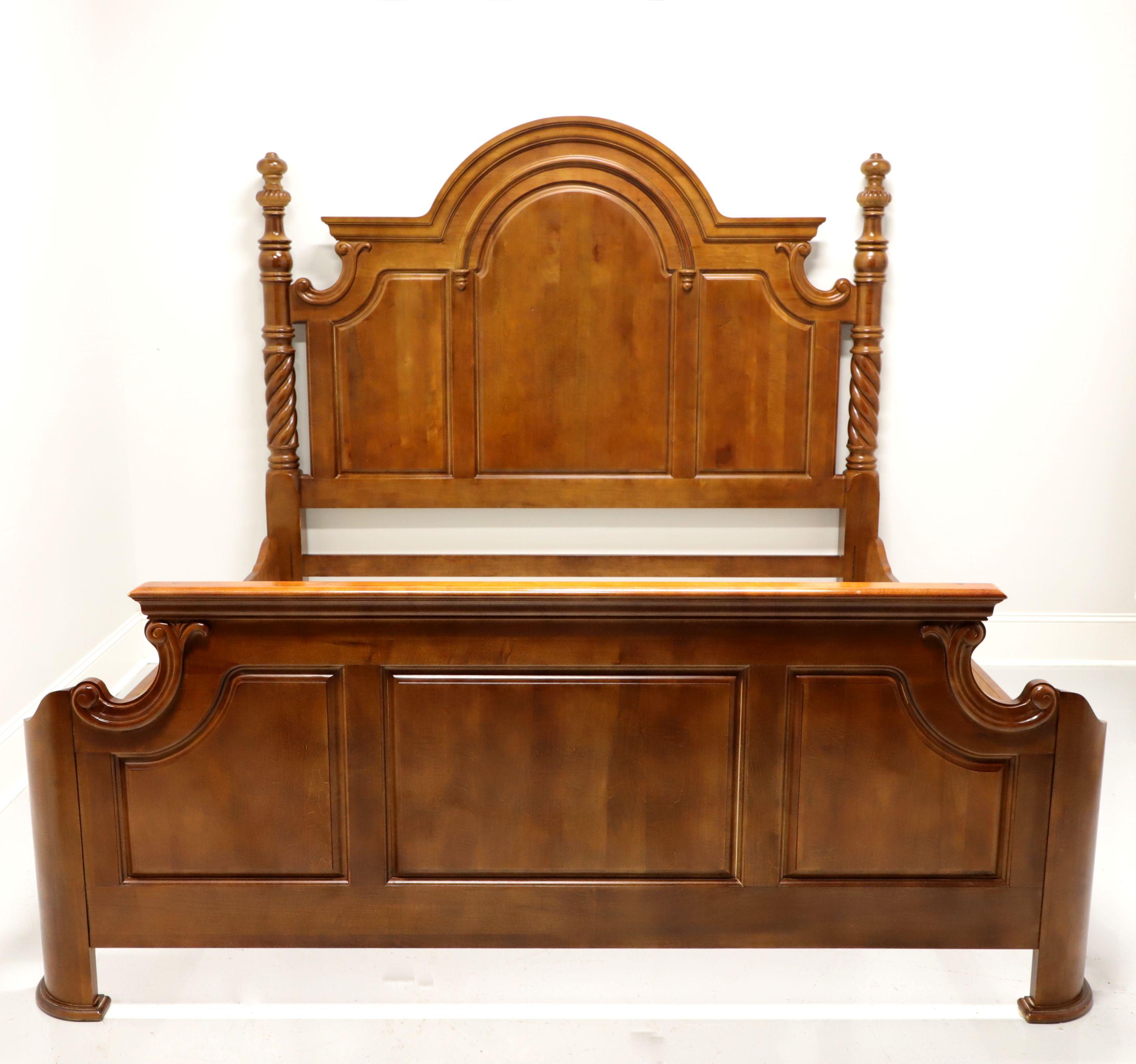 A king size panel bed in the Victorian style, unbranded. Maple with veneers, an arced top with decoratively carved & barley twist posts to headboard, curved inward footboard to attach to side rails and decoratively carved scroll accents. No mattress