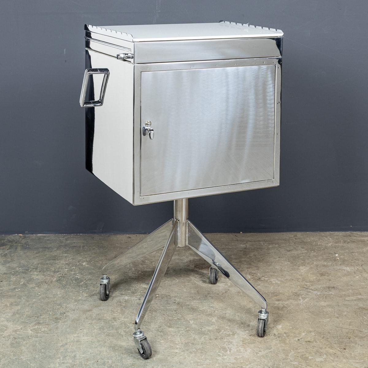 A vinatge mid 20th Century swivel cabinet crafted and designed by Italian designer Alessandro Weiss. This cabinet boasts a sleek, highly polished exterior with the top retaining the pristine white enamel finish, originally used as a dentistry