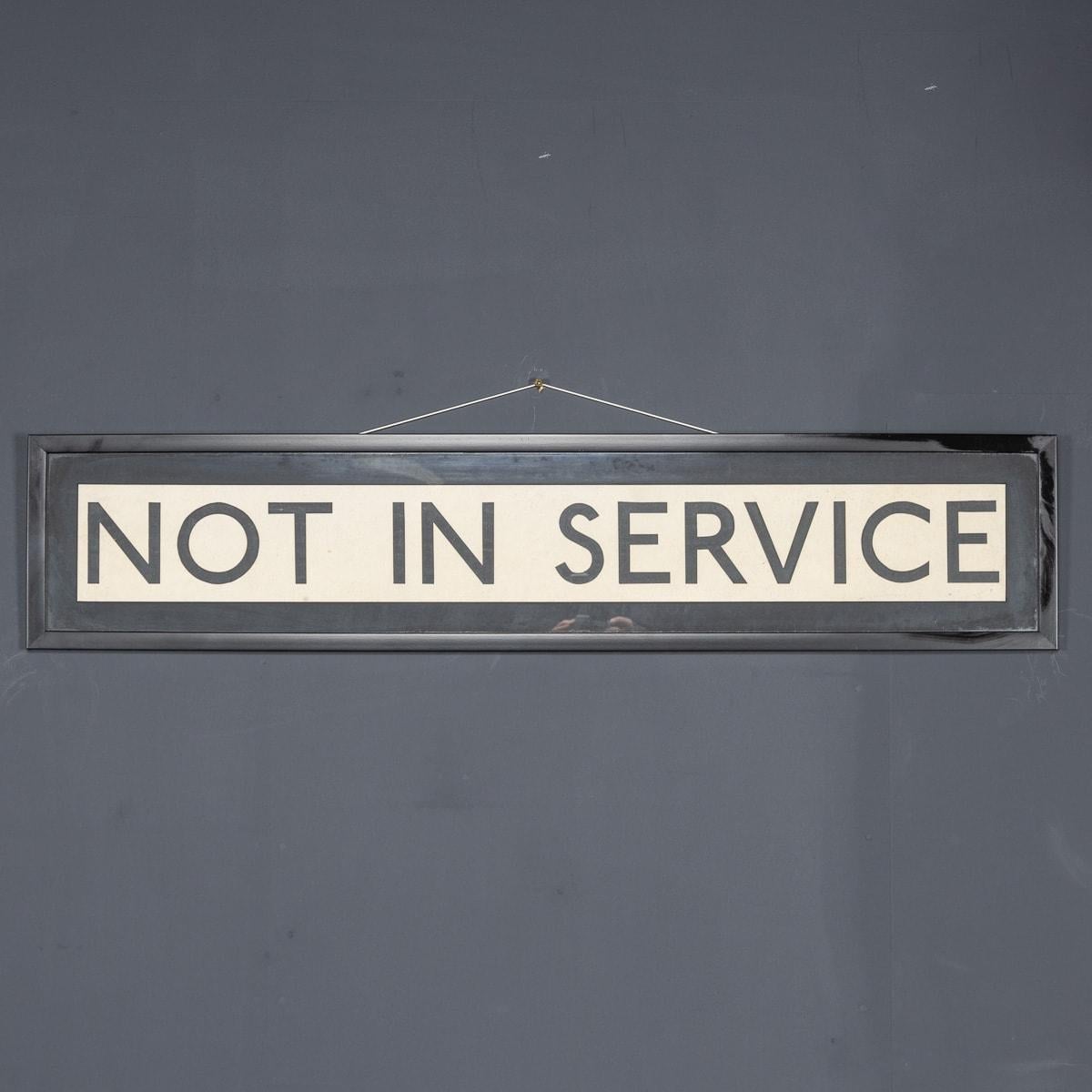A wonderful mid 20th Century Transport for London sign, hailing from the iconic red route master buses of London. This piece of history is elegantly framed in black. Whether for enthusiasts or as a decorative accent, it's a fabulous addition to any