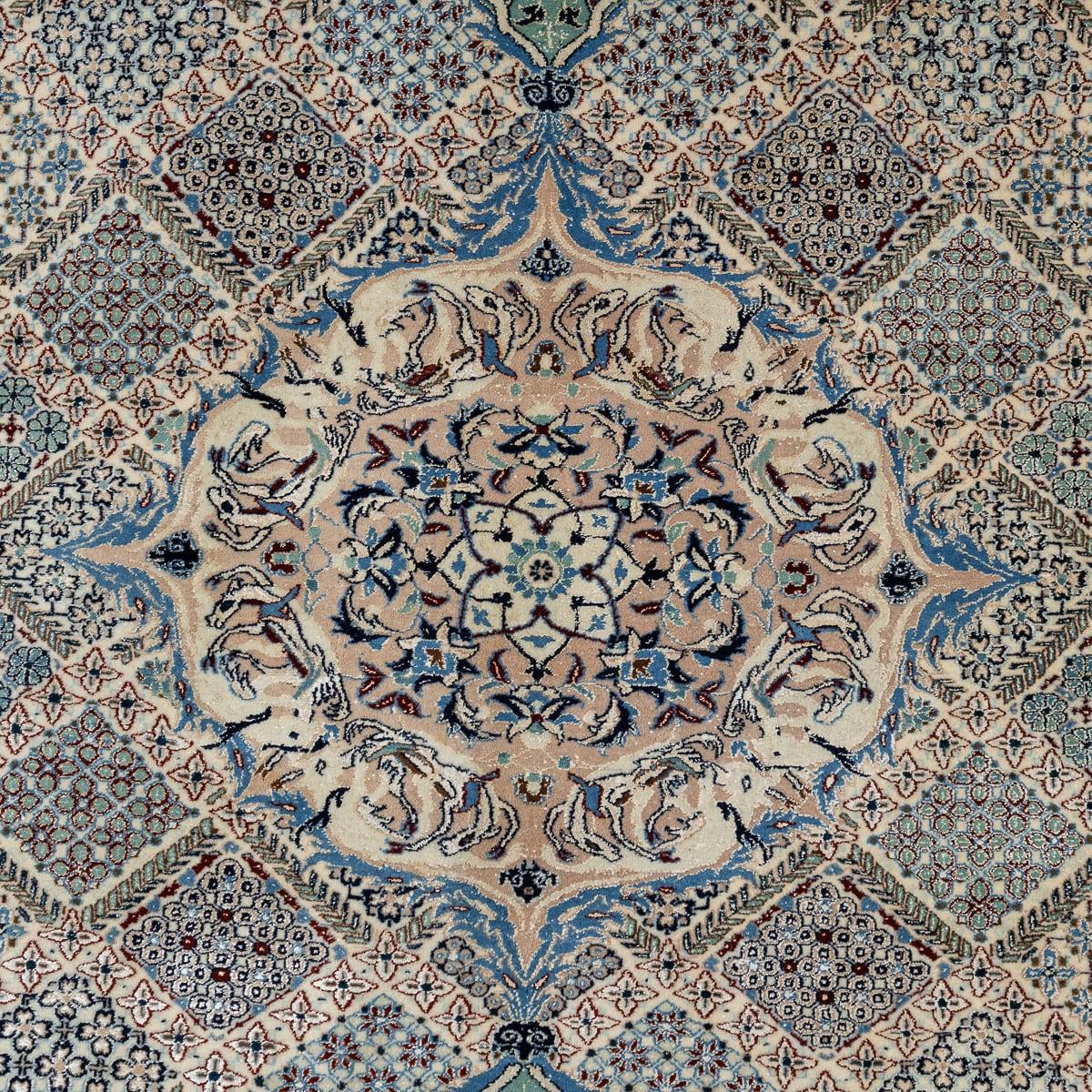Vintage 20th Century Persian fine handmade Nain 6LA rug featuring a unique dragon and deer design rich in detail. The medallion is intricately adorned with boxes, each showcasing a distinct pattern. Crafted from 50% silk and 50% wool, it features an