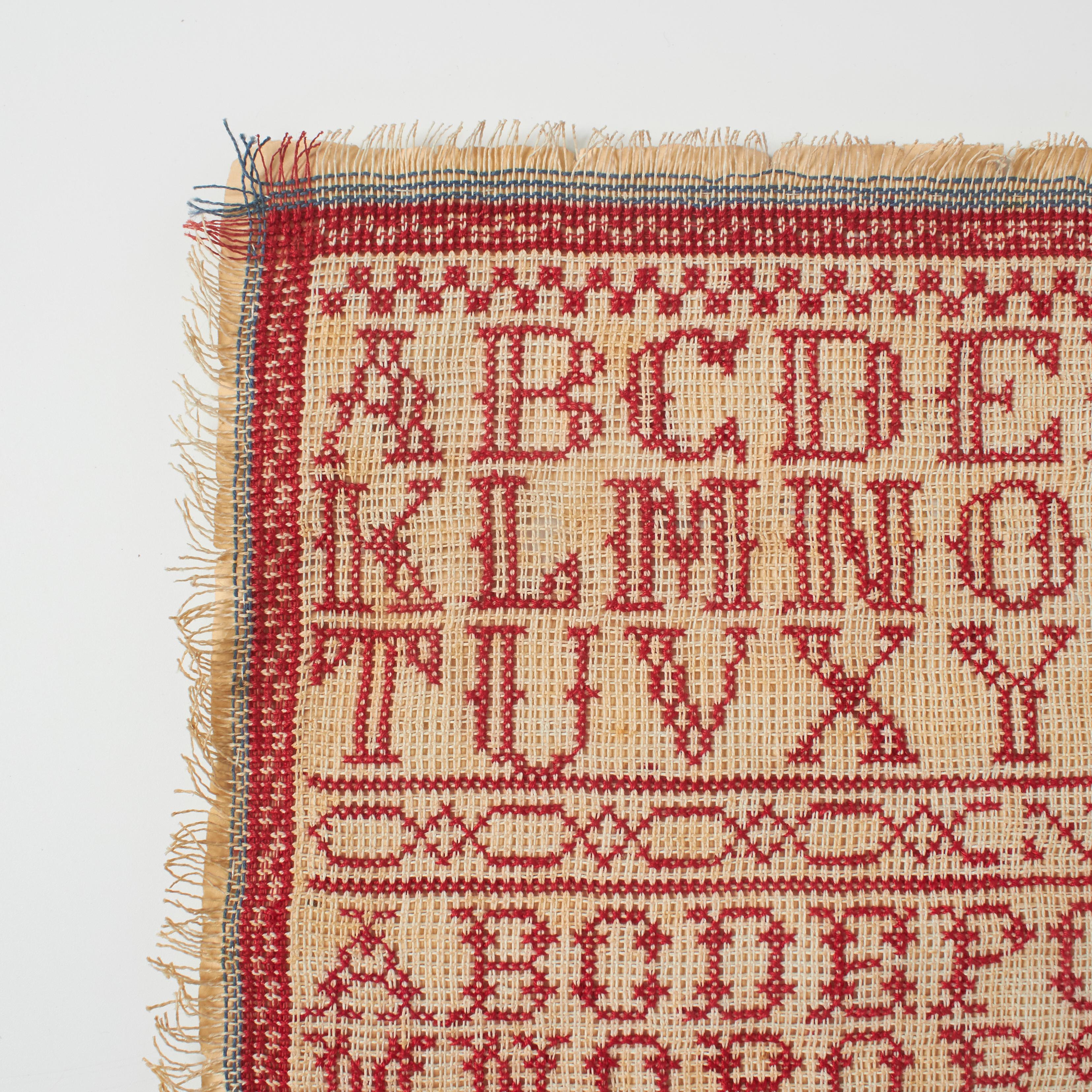Vintage 20th Century Red and White Cross-Stitch Sampler with Alphabet & Numbers In Fair Condition For Sale In Barcelona, Barcelona