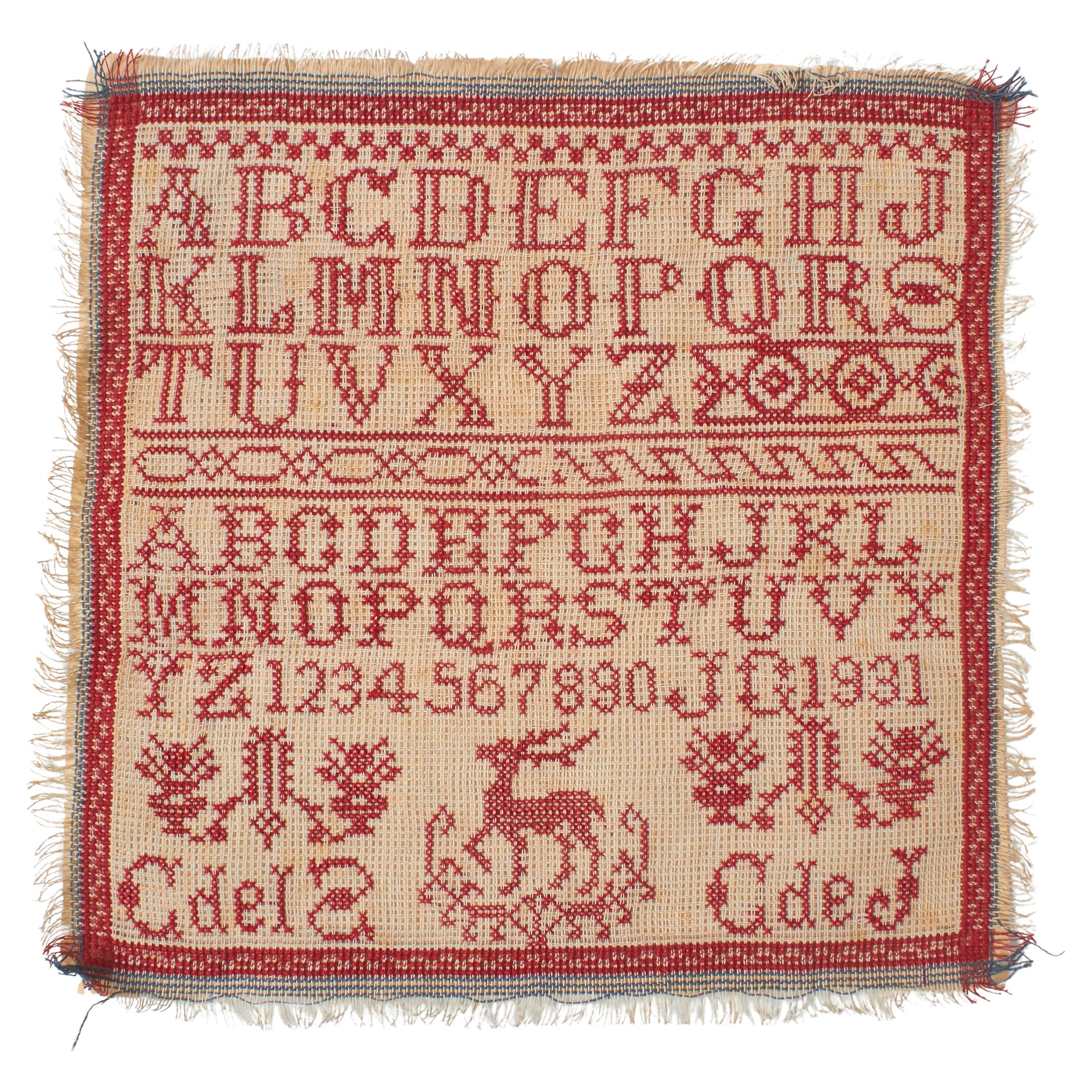 Rotes und weißes Kreuzstich-Sammlerstück des 20. Jahrhunderts mit Alphabet und Zahlen
