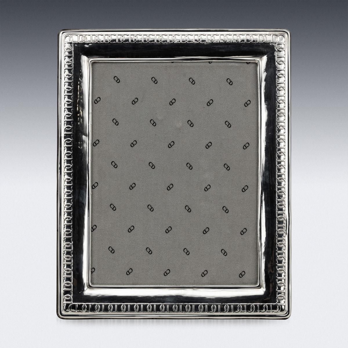 A vintage mid-20th Century French picture frame designed and crafted by the world renowned fashion house Christian Dior. Its embossed 