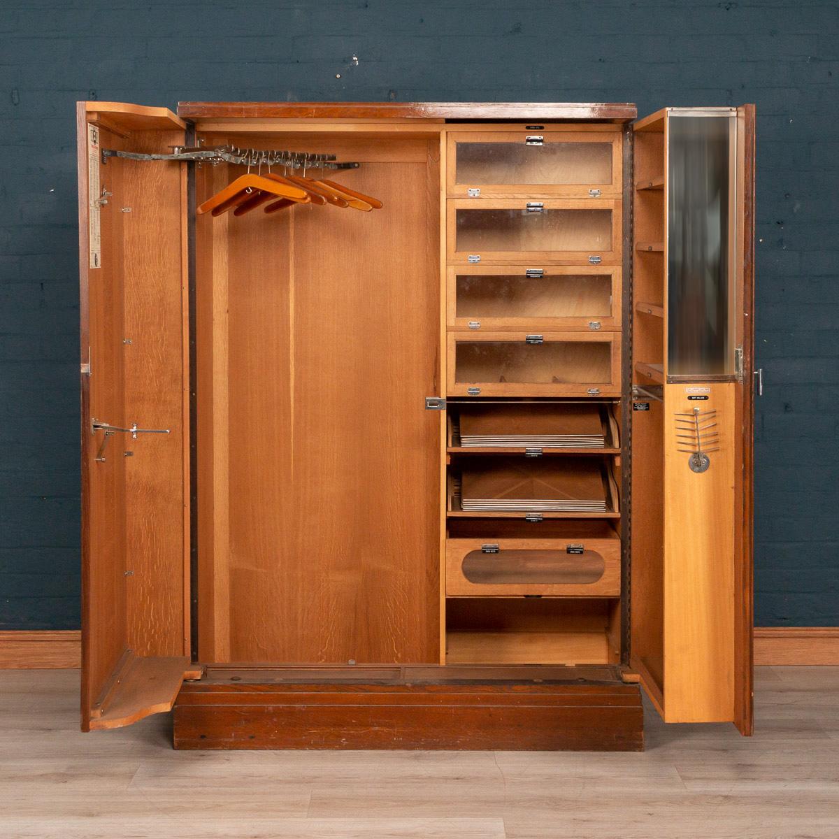 Rare Art Deco wardrobe by Compactom, England 1930s. Beautiful piece of furniture, looking very anonymous when closed but once opened reveals a wonderful array of compartments for the gentleman’s wardrobe of the period, including sections for shirts,