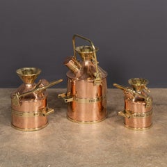 Vintage 20thC English Set Of Three Polished Checkpump Petrol Canisters c.1965