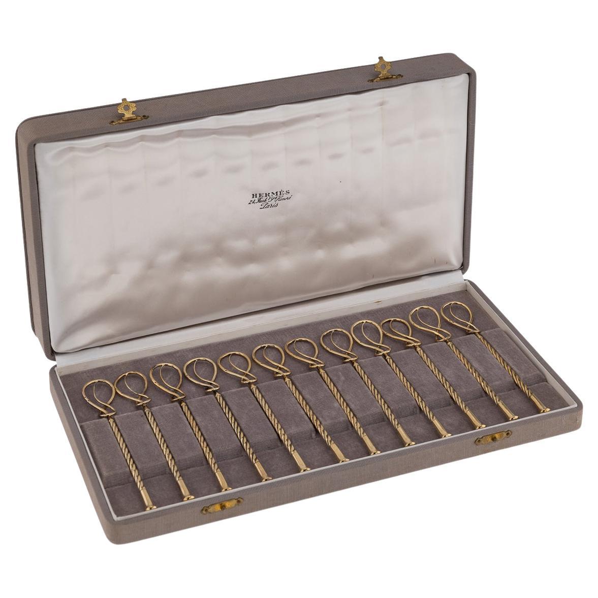 Vintage 20thC Juego de 12 agitadores de champán Hermès de plata maciza dorada, Francia