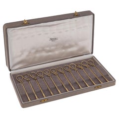 Vintage 20thC Juego de 12 agitadores de champán Hermès de plata maciza dorada, Francia