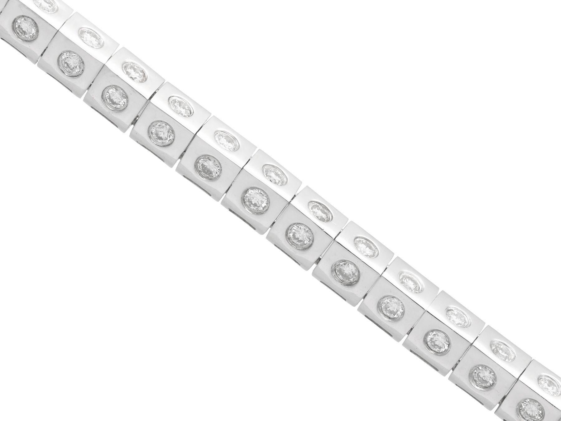 A fine and impressive vintage 2.10 carat diamond and 18 carat white gold bracelet; part of our diverse diamond jewellery and estate jewelry collections

This fine and impressive vintage diamond bracelet has been crafted in 18ct white gold.

This