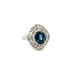 Vintage 2.15 Carat Oval Sapphire GIA and Diamond Platinum Double Halo Ring (bague à double halo en platine)