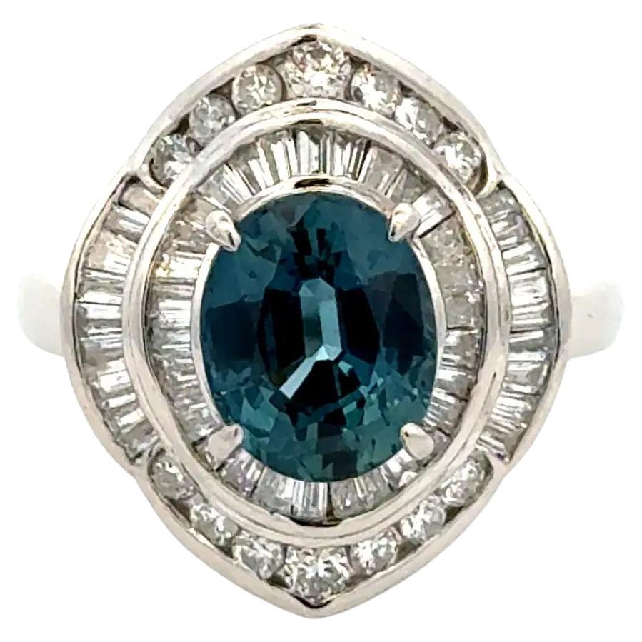 Vintage 2.15 Carat Oval Sapphire GIA and Diamond Platinum Double Halo Ring For Sale