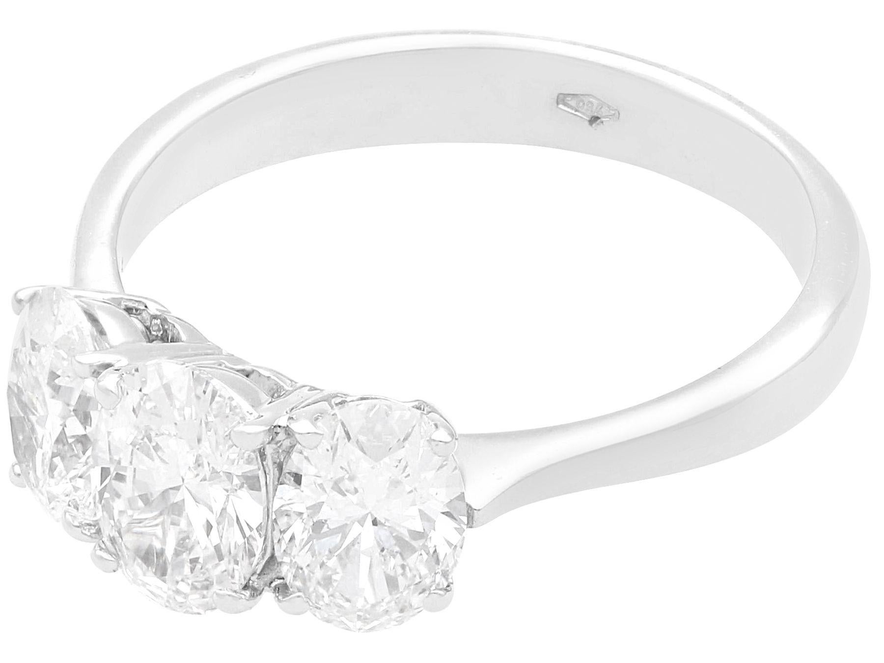Oval Cut Vintage 2.19 Carat Diamond and White Gold Trilogy Engagement Ring, circa 1980 For Sale