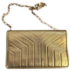 Vintage 21st Century Gold Leather Clutch Bag by Yves Saint Laurent