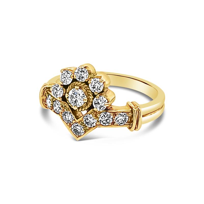 This vintage ring features 13 round cut diamonds with a total weight of 0.65 carats set in 22 karat gold. It is a size 6.75 but can be resized upon request. This ring is fit for a princess!
