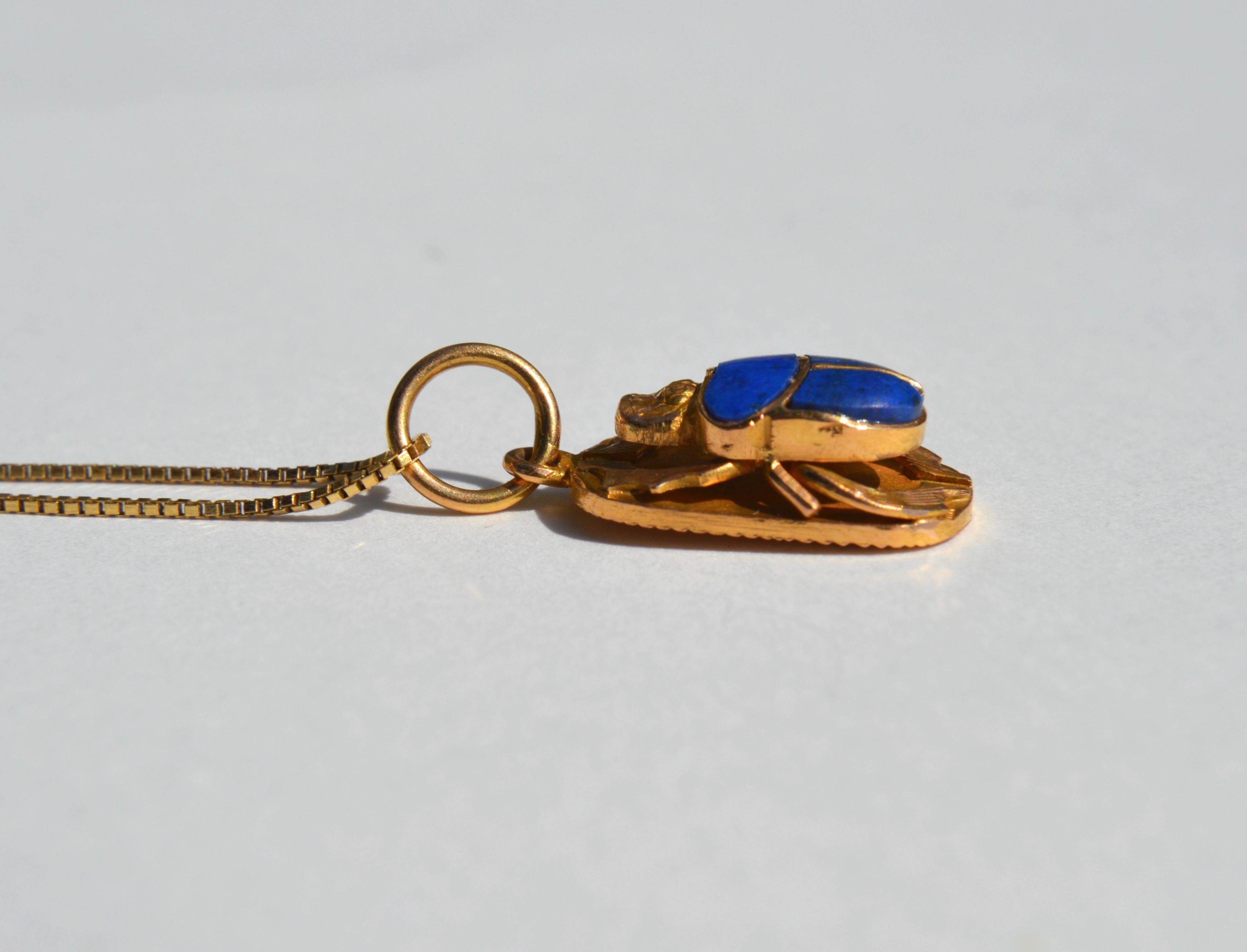 Beautiful vintage midcentury 22K yellow gold lapis lazuli Egyptian revival scarab beetle charm. Chain not included. In very good condition, measures 3/4