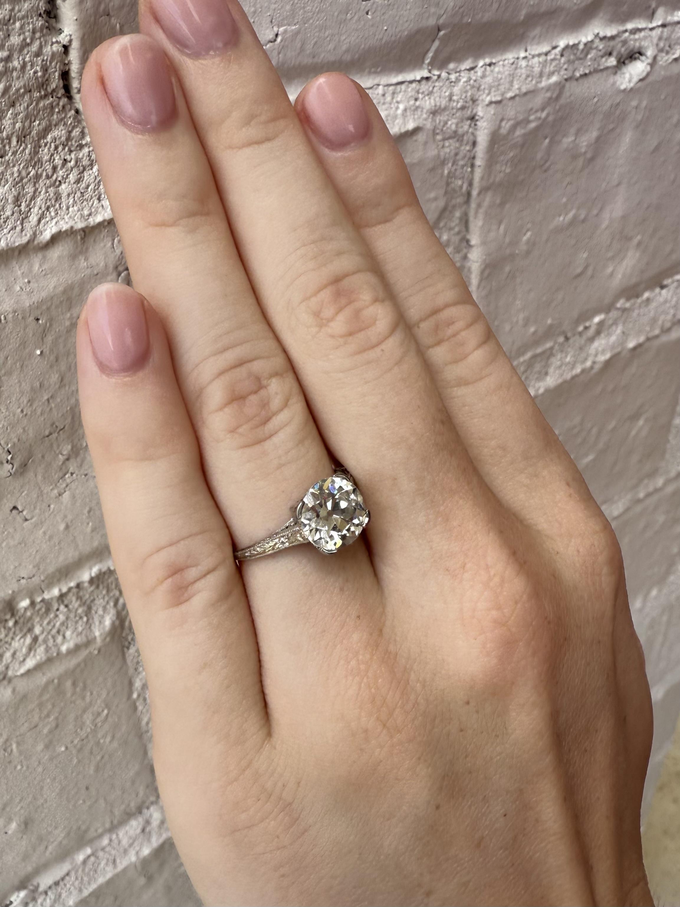 We are thrilled to offer this vintage gem!!
She is the perfect antique solitaire engagement ring.

Ring Details
Material: Platinum
Era: Art Deco 1920 - 1940
Head Width: 6.3mm
Head Height: 5.6mm
Weight: 3.3 Grams
Finger Size: 6 3/4

Accented by the