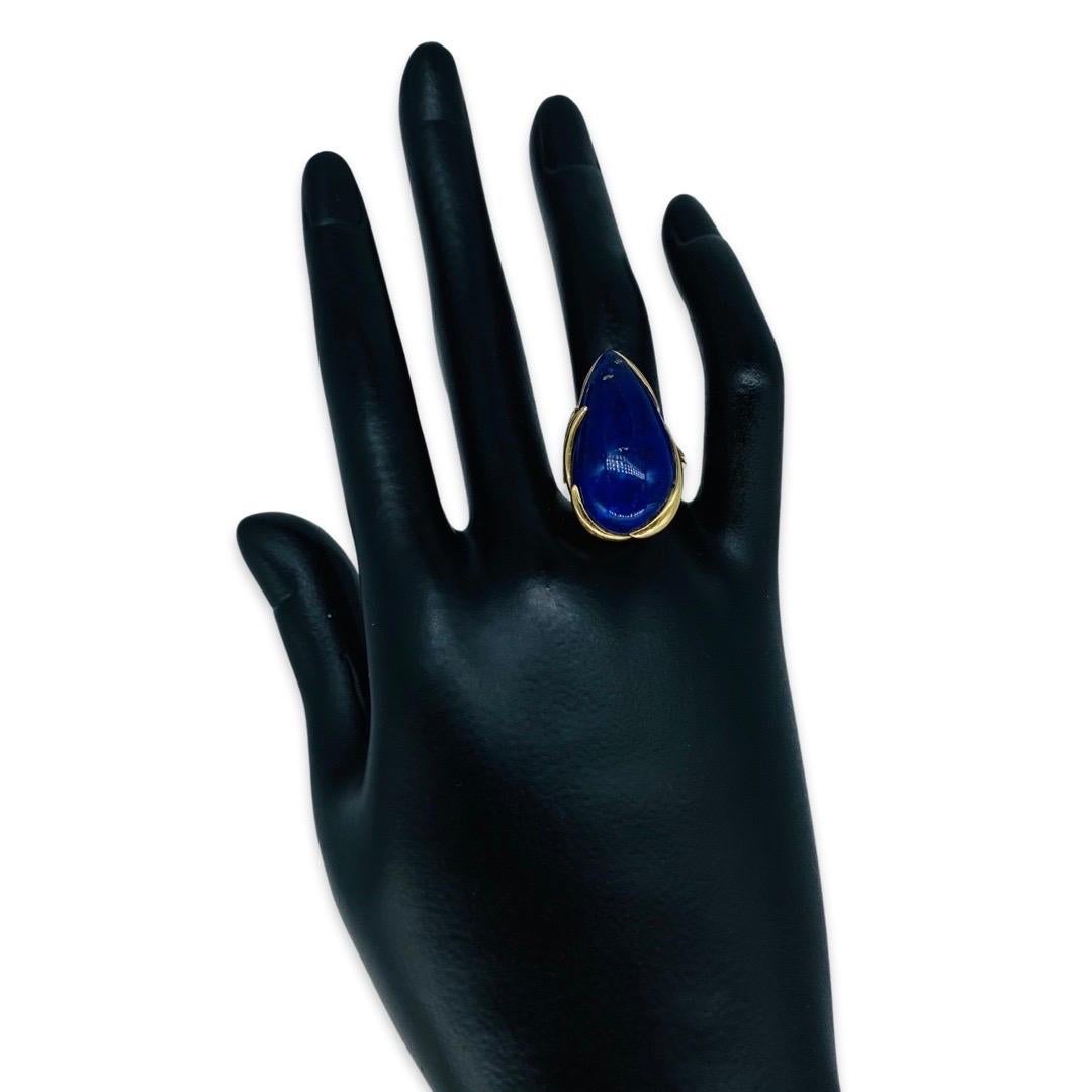 Vintage 22.35 Carat Lapis Lazuli Cabochon Pear Cut Cocktail Ring 14k Gold. Large lapis lazuli gemstones weighing approx 22.35 carat by formula. The ring is a size 7.5 and weights 7g