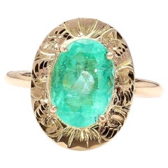 Vintage 2.24 Carat Oval Light Green Emerald 14K Gold Engraved Disc Ring