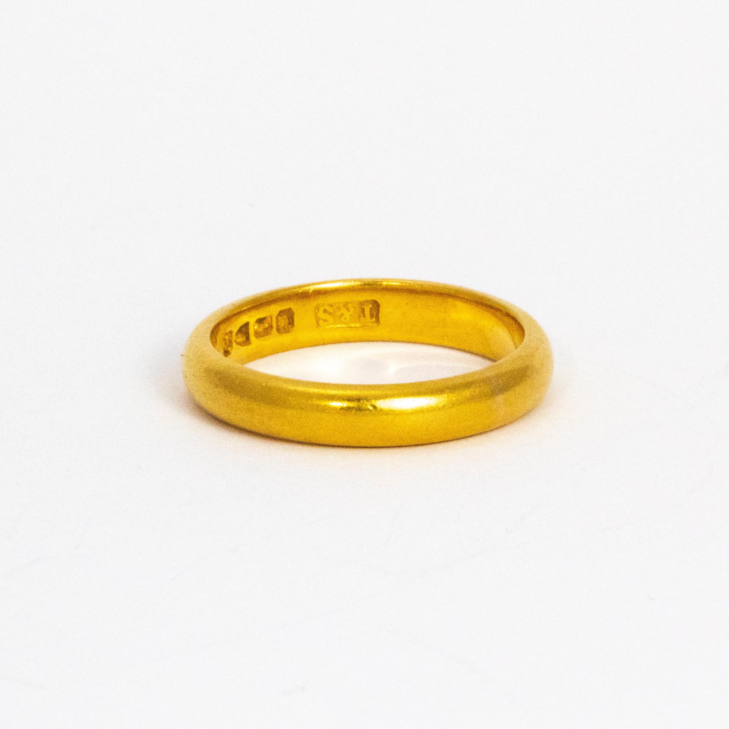 Glossy 22ct gold band, perfect for a wedding band or just a simple everyday piece.

Ring Size: N or 6 3/4