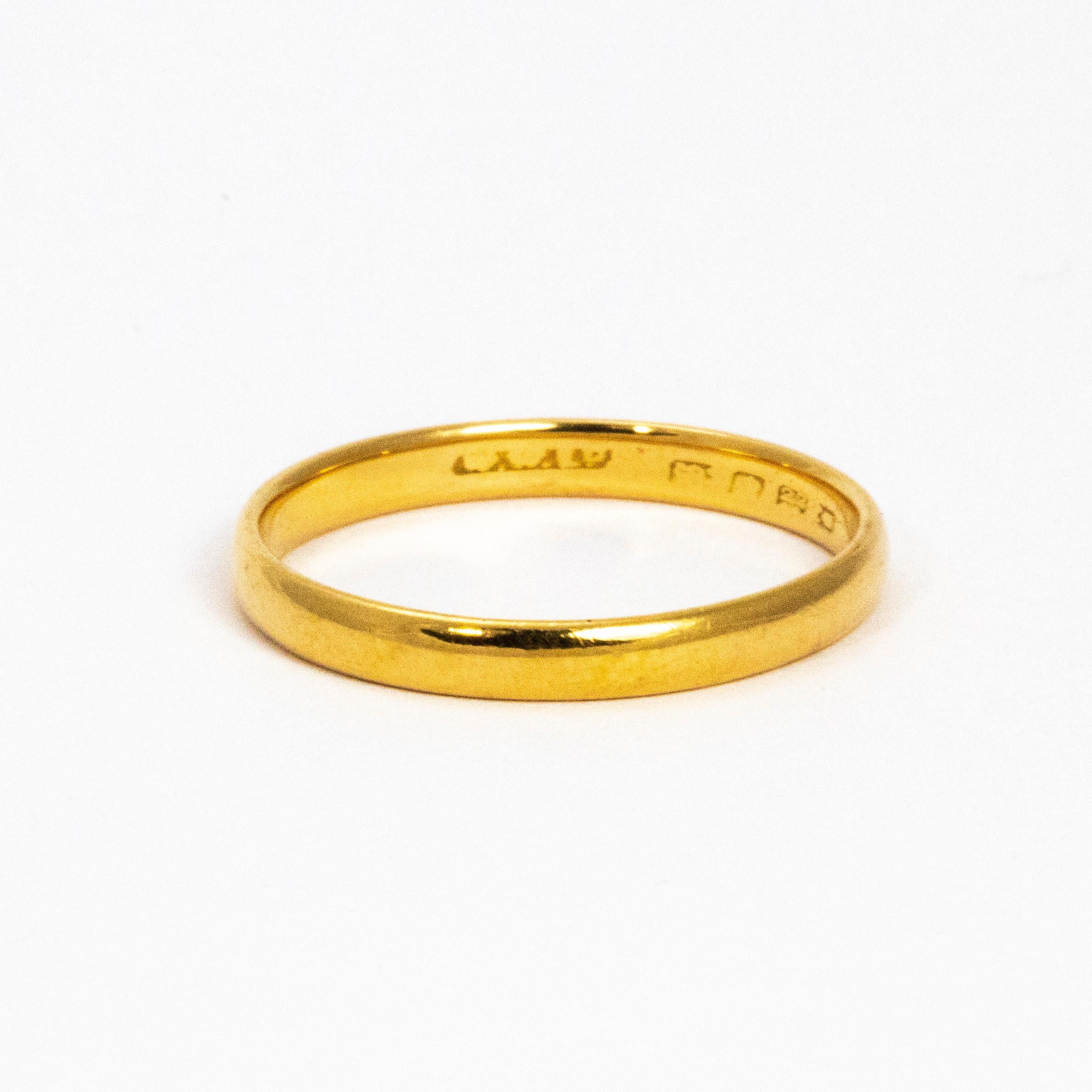Never going out of fashion, this classic 22ct gold band measures approx 2mm wide and would make a perfect wedding band or a simple everyday ring.

Ring Size: N or 6 3/4

