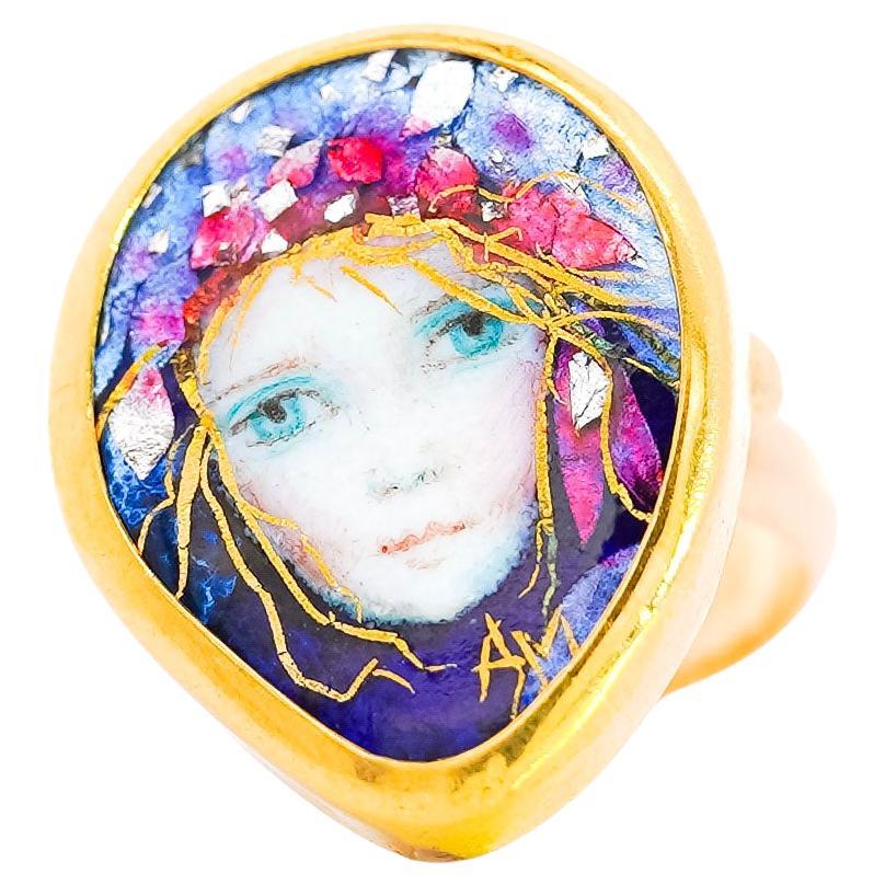 22K Enamel and Gold Saint Mary motif Ring.

This 22K gold ring features a artistic portrait of 