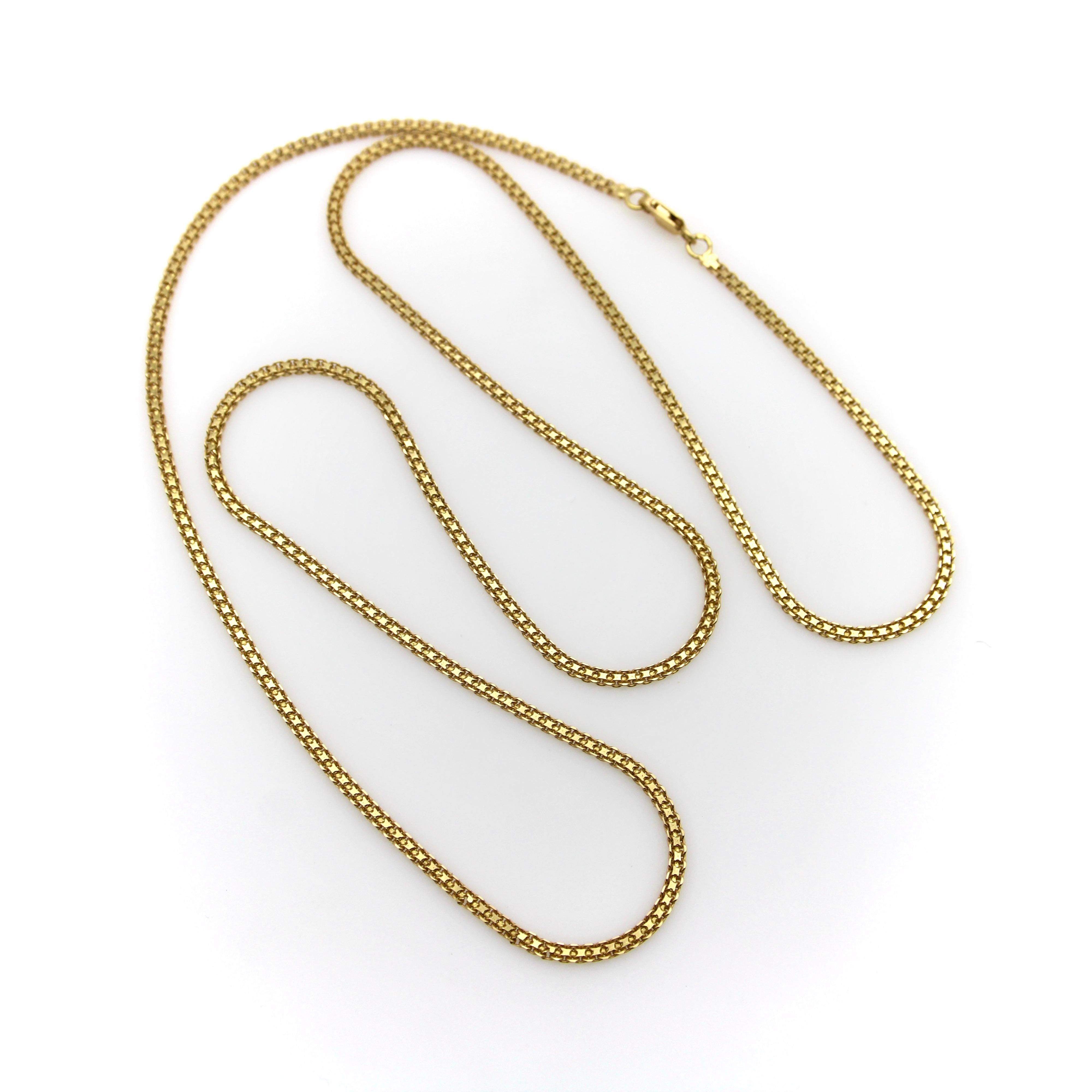 This gorgeous handmade necklace consists of a flattened double Bismark link in a warm 22k gold. The extra long chain has a classic design and the deep buttery golden tone that higher karat gold is known for. The Bismark link is made from layered