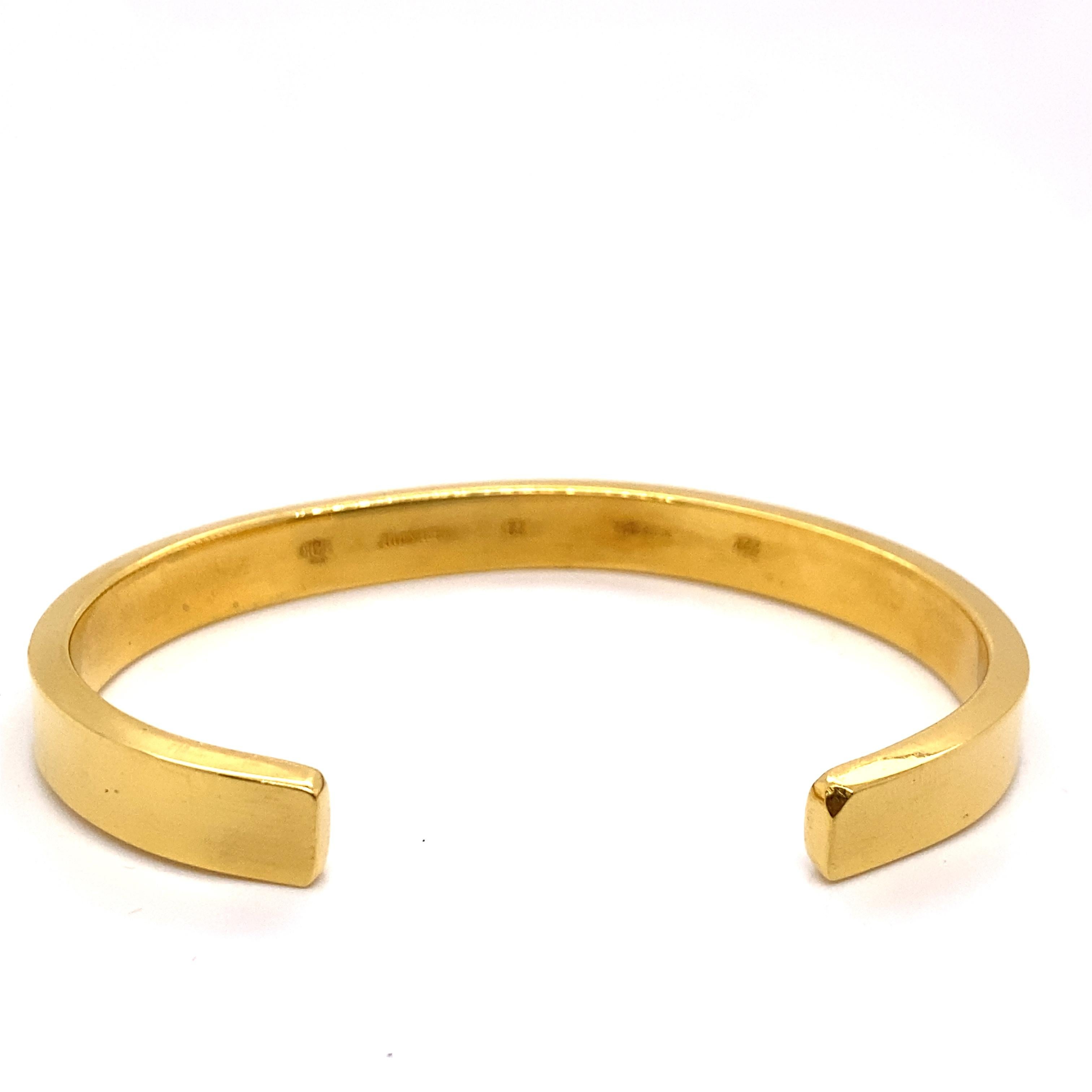 Vintage 22K Yellow Gold Cuff Bracelet - The width of the cuff bangle is .25 inches. The inside diameter is 2 inches high by 2.75 inches wide. It is stamped 22K and with the maker's mark 