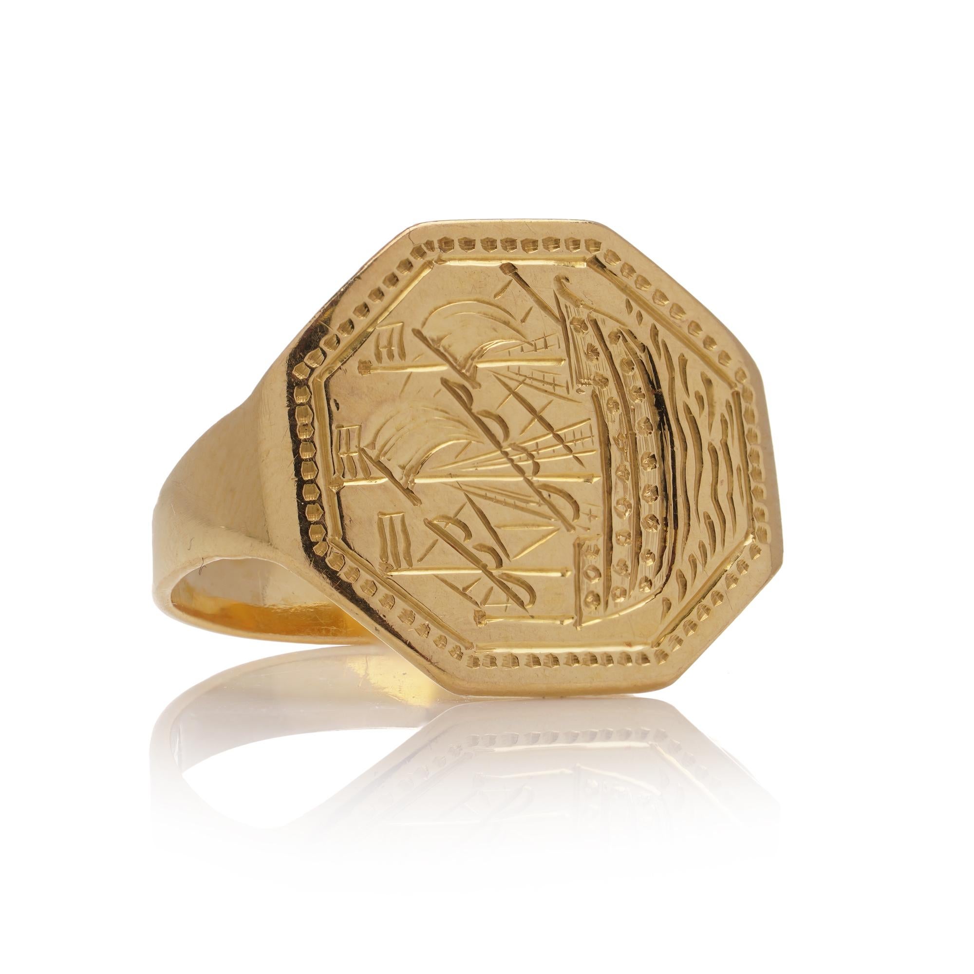 Vintage 22kt. yellow gold signet ring featuring the man-of-war ship. 
Made in England, Sheffield, 1983
Maker: DB ( Unidentified )                                                                                                                        
