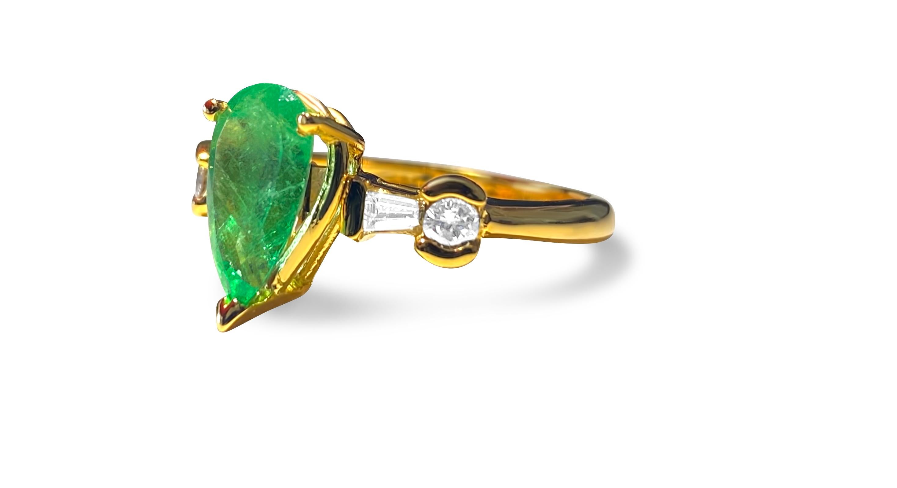 Metal: 14K yellow gold.

Diamonds: 0.40 carat weight total, VS-SI clarity and G color, round brilliant cut and baguette cut. 100% natural earth mined and genuine diamonds.

Emerald: 1.90 carat weight total, deep saturation and luster. Pear shape,
