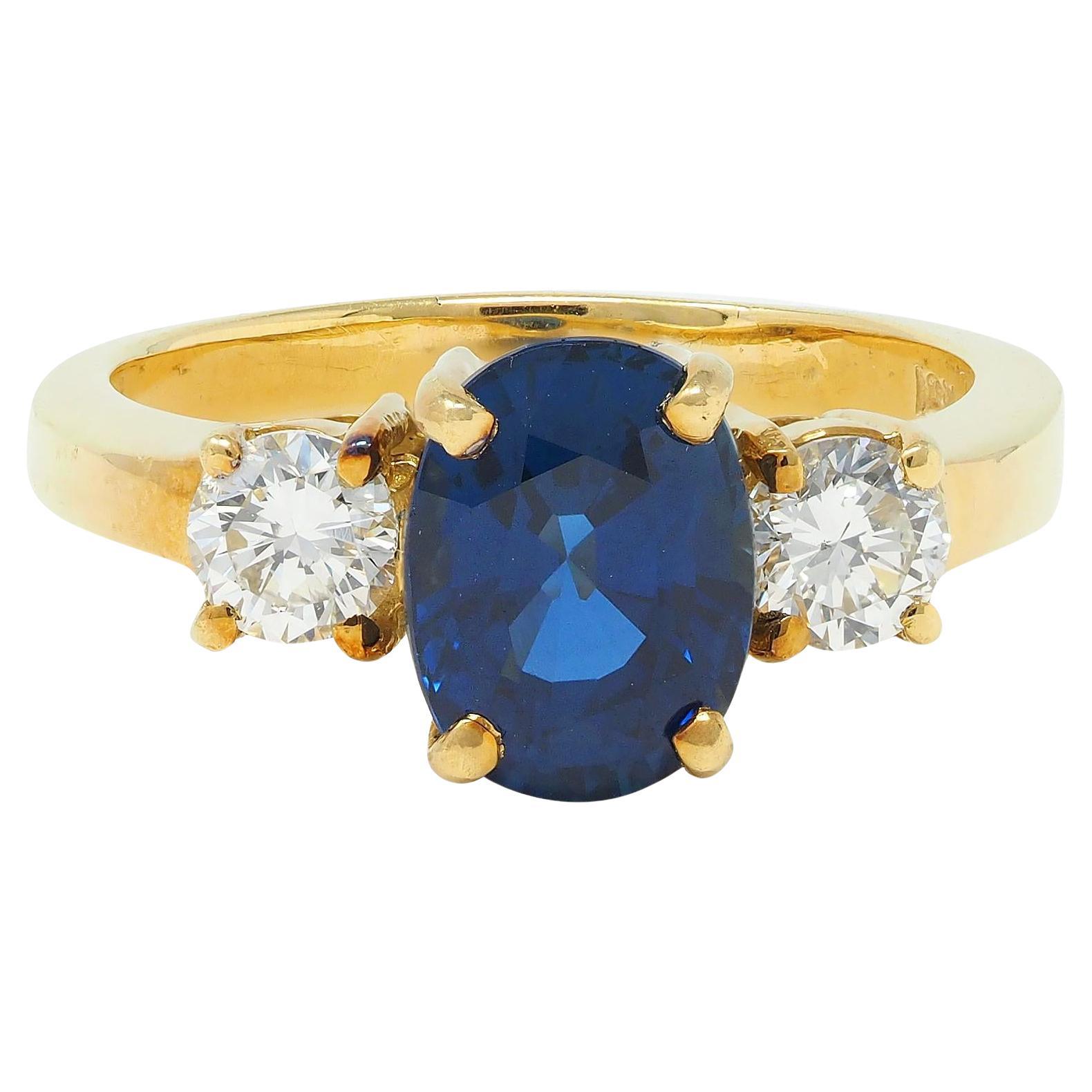 Vintage 2.32 CTW Sapphire Diamond 18 Karat Yellow Gold Three Stone Ring GIA For Sale