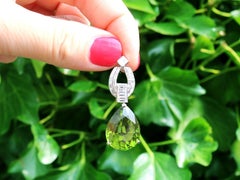 Vintage 23.20 Carat Peridot and 1.38 Carat Diamond Platinum Pendant