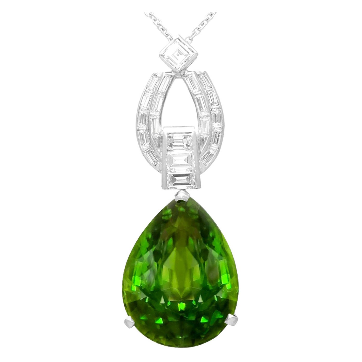 Ciondolo vintage in platino con peridoto da 23,20 carati e diamante da 1,38 carati
