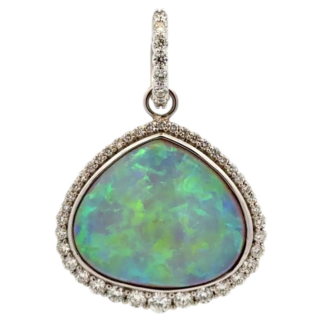 Vintage 23.24 Carat Opal and Diamond Halo Gold Pendant For Sale