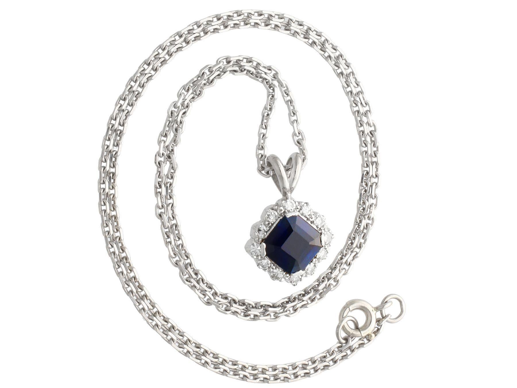 A fine and impressive vintage 2.35 carat blue sapphire and 0.32 carat diamond, platinum cluster pendant; part of our diverse gemstone jewelry collections.

This fine and impressive sapphire pendant has been crafted in platinum.

The pierced