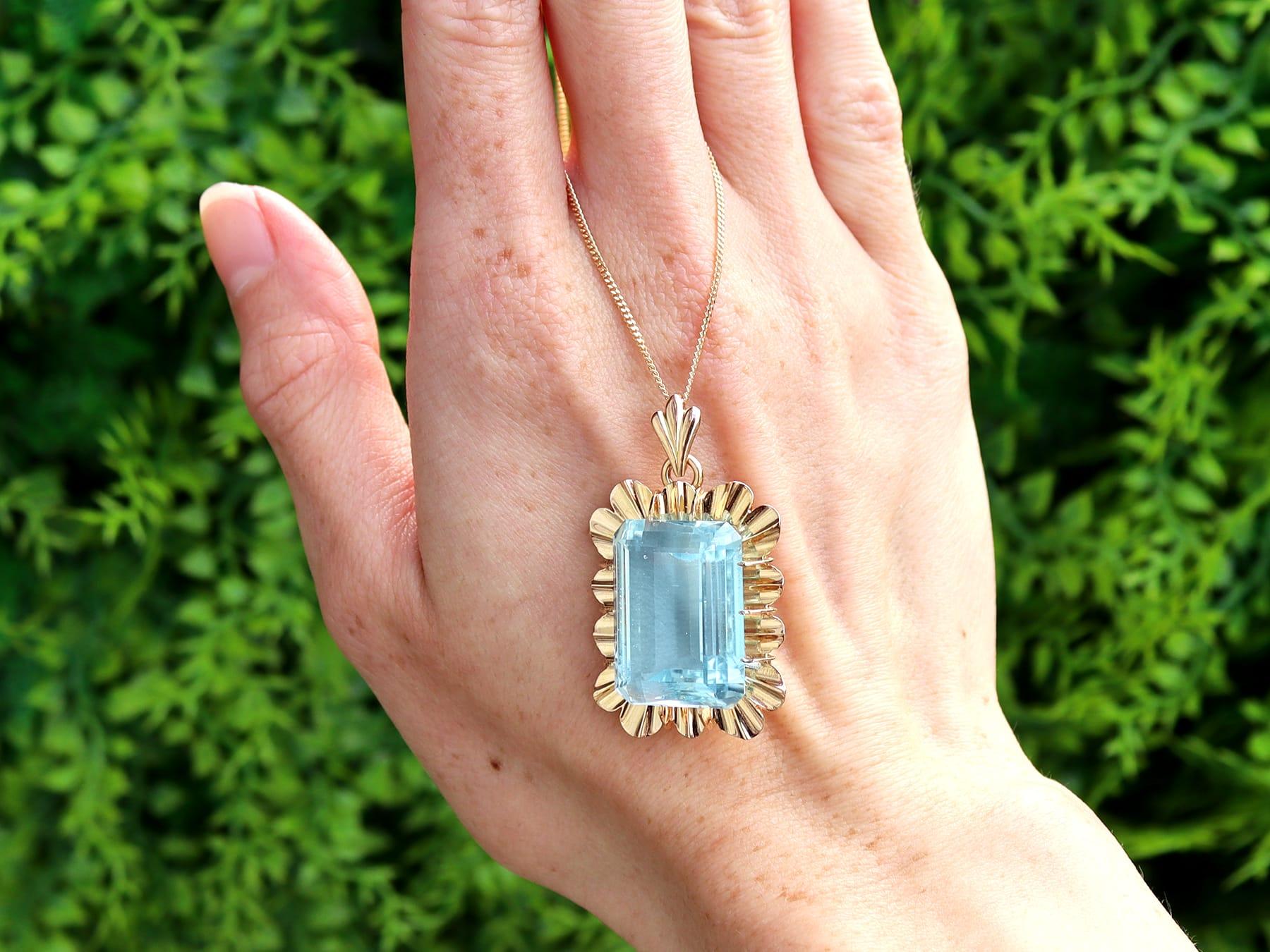 A stunning, fine and impressive, large 23.66 carat aquamarine and 18 karat yellow gold pendant; part of our diverse aquamarine jewellery collections.

This stunning, fine and impressive aquamarine pendant has been crafted in 18k yellow gold.

The