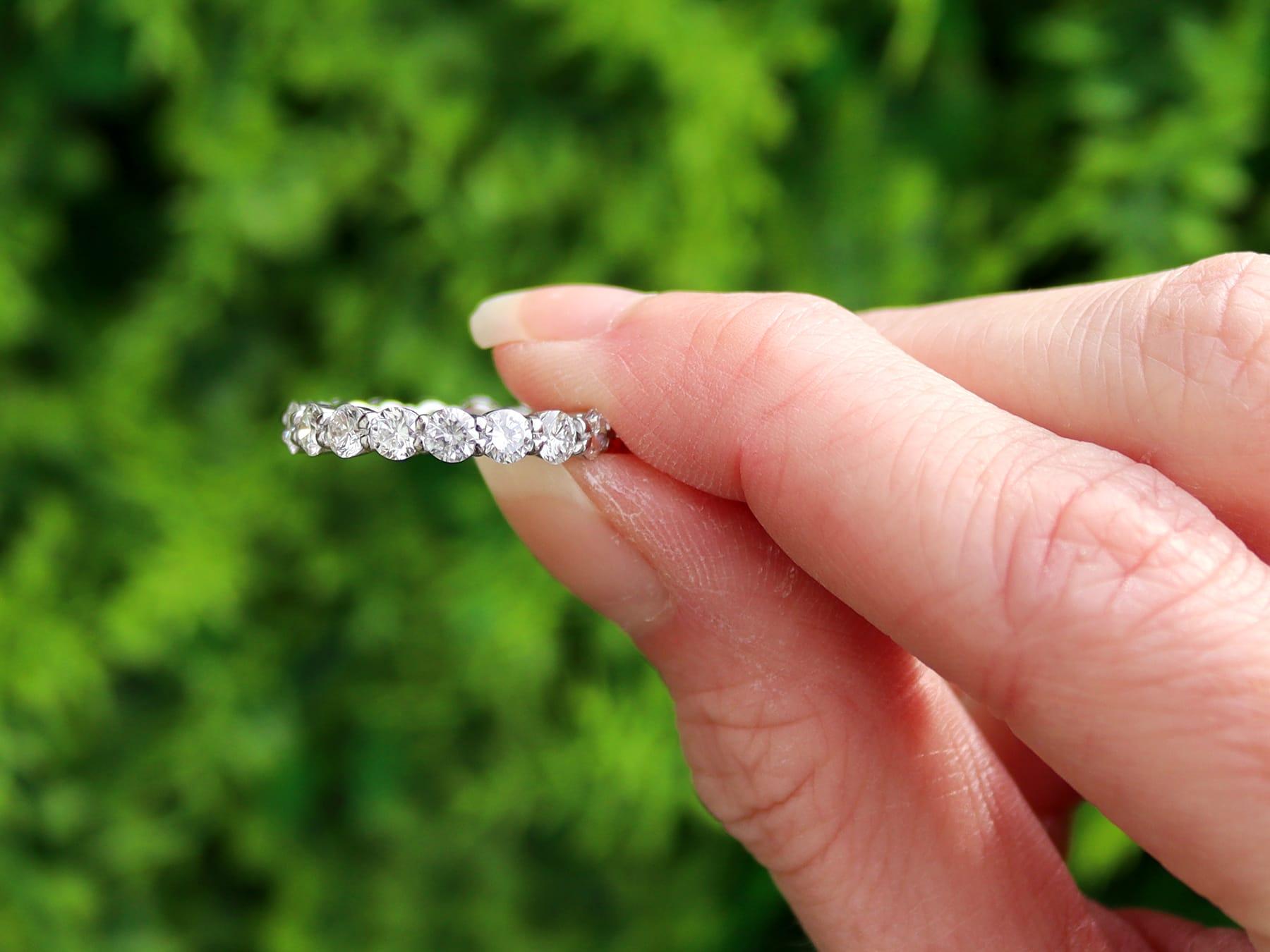 A stunning, fine and impressive vintage 2.38 carat diamond, 18 karat white gold full eternity ring; part of our diamond jewelry collections.

This stunning, fine and impressive vintage eternity ring has been crafted in 18k white gold.

The ring is