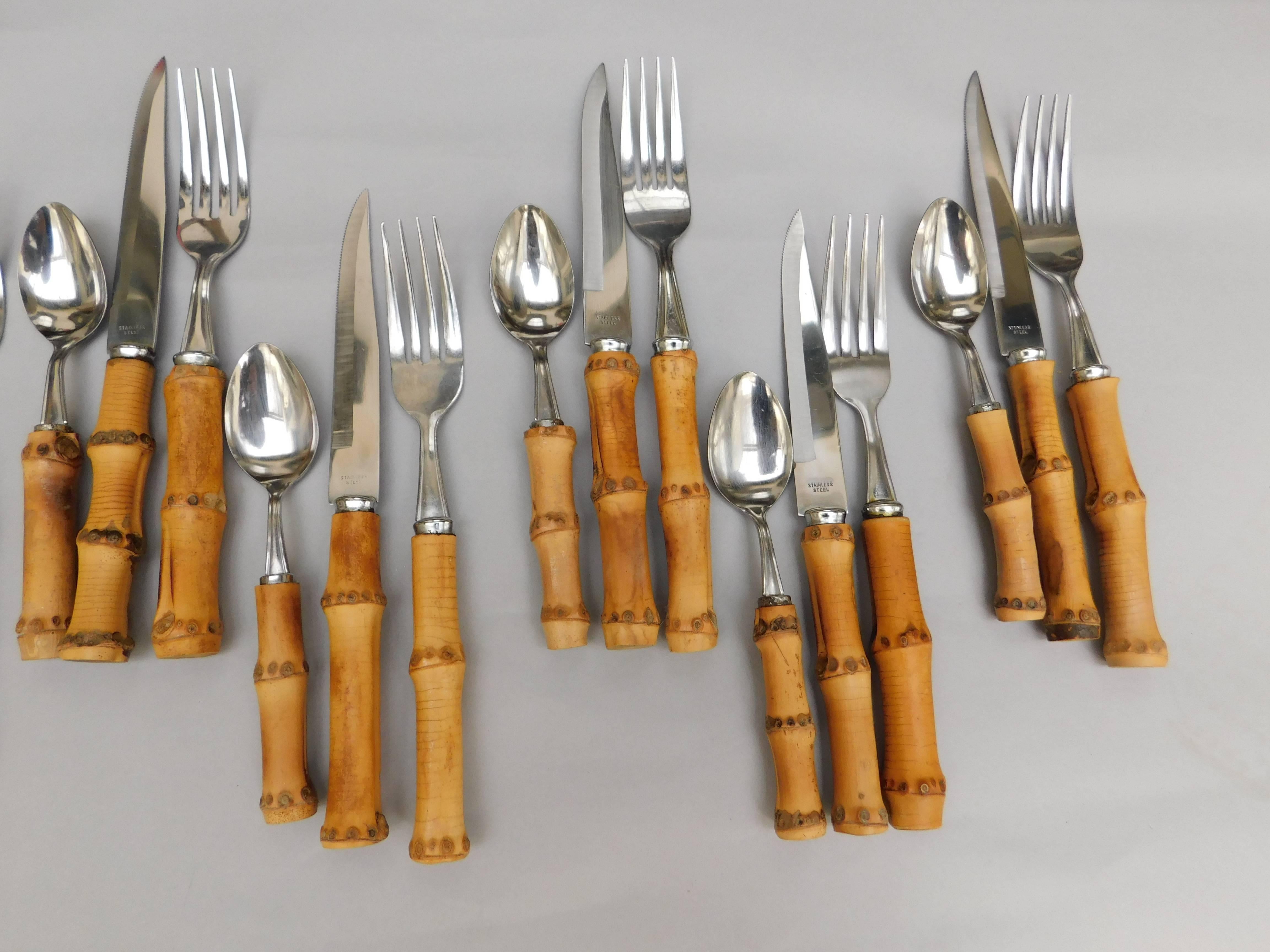 1960s bamboo handled stainless steel flatware set containing 24 pieces.
Eight knives
Eight spoons
Eight forks
measurement listed is for the spoon.
fork and knife=20 cm (8