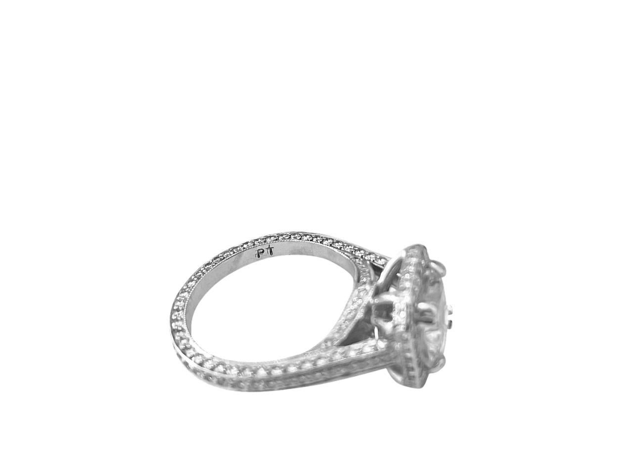 Introducing this stunning engagement ring crafted from 14k white gold, featuring a brilliant 2.40 carat cubic zirconia princess-cut center stone, elegantly set in prongs. Accentuating the centerpiece are 2.25 carats of round brilliant-cut side