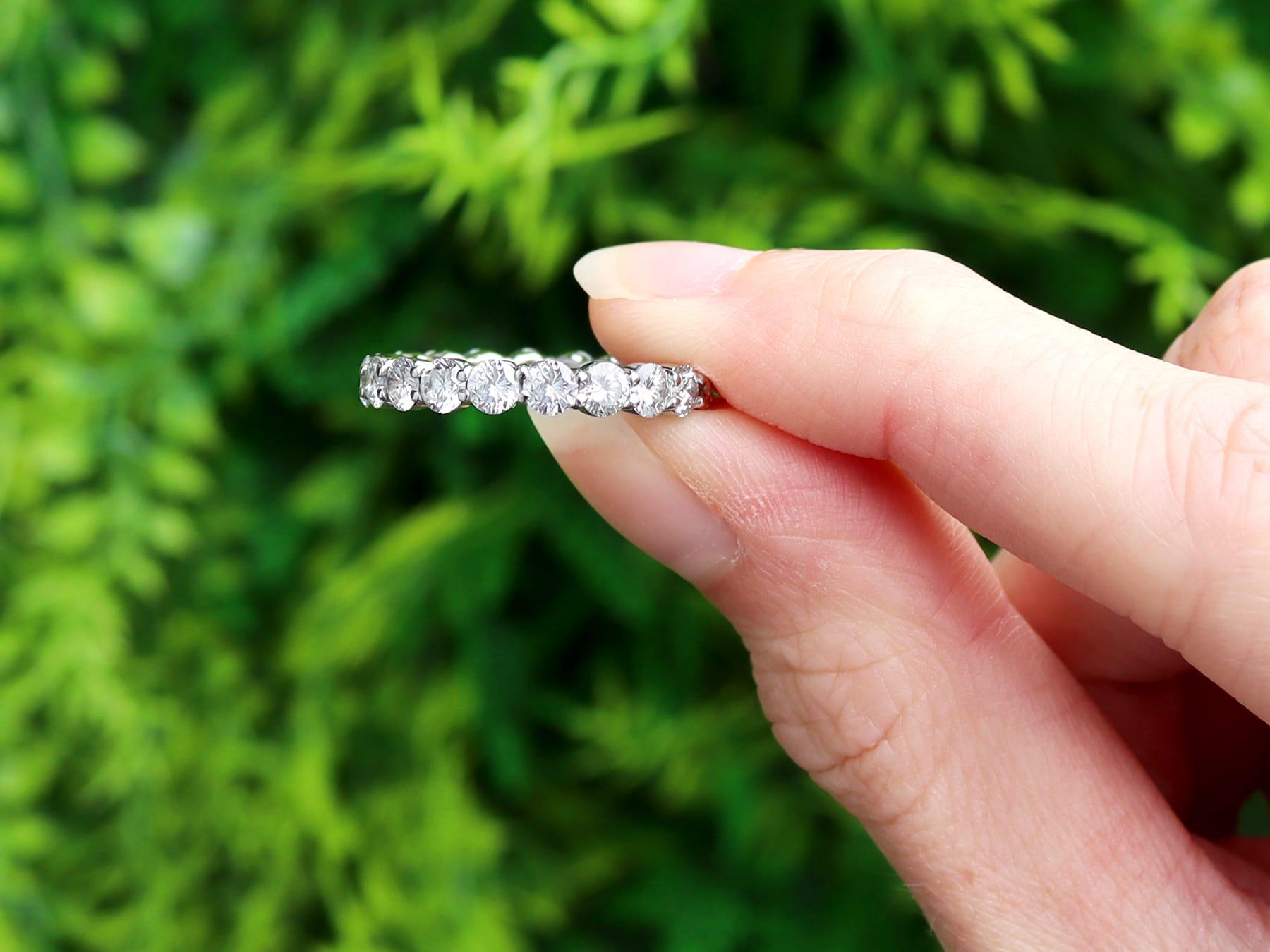 A stunning, fine and impressive vintage 1950's 2.42 carat diamond and platinum full eternity ring; part of our collection of vintage diamond rings.

This stunning, fine and impressive vintage eternity ring has been crafted in platinum.

This 1950's