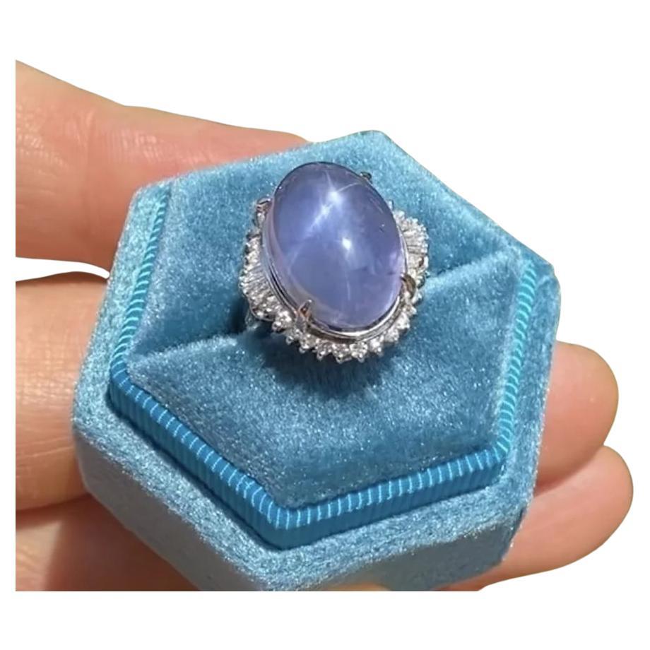 Platinring mit 24,40 Karat ovalem blauem Sternsaphir und Diamant im Angebot