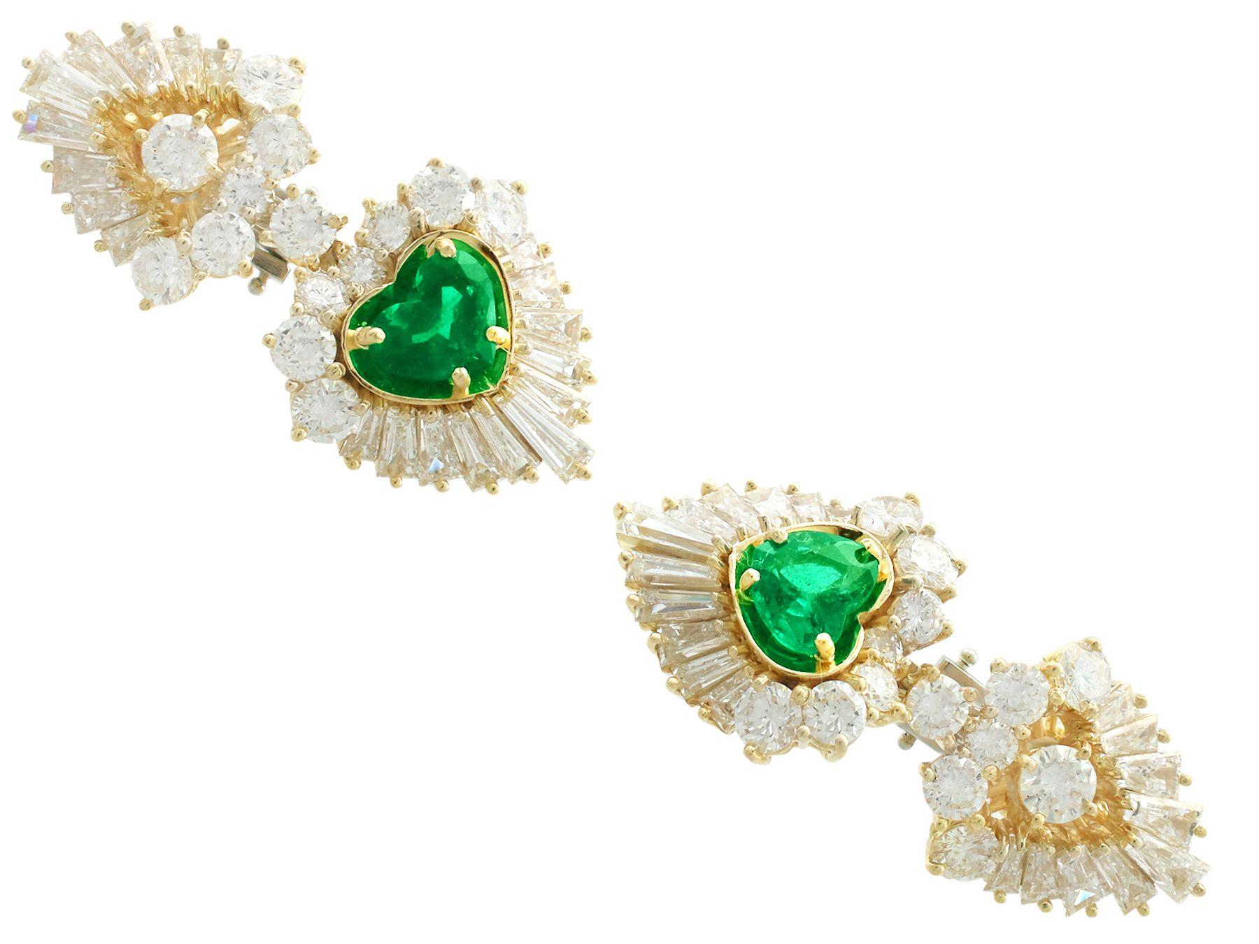 A stunning pair of 2.48 carat Zambian emerald and 7.05 carat diamond, 18 karat gold clip on earrings; part of our diverse vintage emerald jewelry collections

This stunning pair of emerald heart earrings has been crafted in 18k yellow gold with 18k