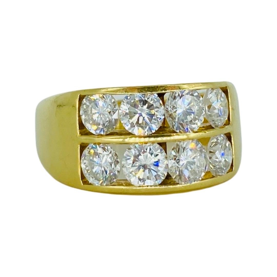 Vintage 2.49 Total Carat Weight Diamonds Channel Setting Ring 18k
The diamonds are SI clarity with G-H color
The ring is a size 8.5 and weights 8 grams 18k gold.