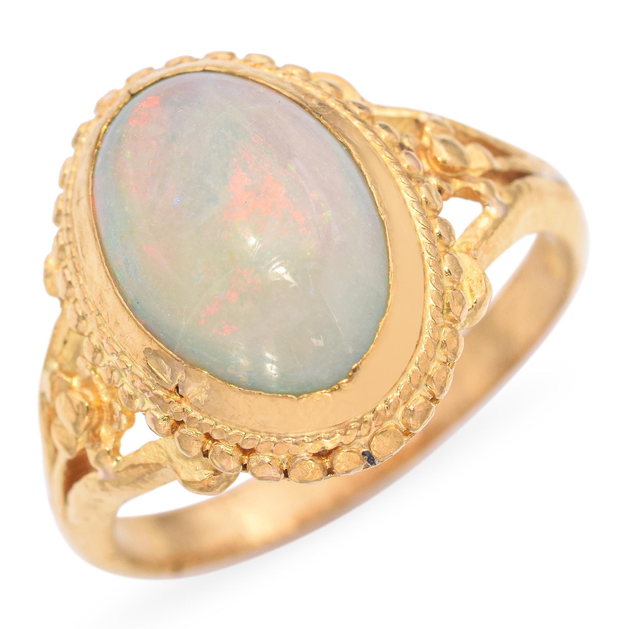 This Vintage 24K Yellow Gold Opal Ring features a stunning opal that displays a mesmerizing play of colors.

Weight: 4.4 Grams
Stone: Opal (11.5 x 8 mm)
Measurements: 22 x 18.3 x 14.4 mm
Ring Size: 5
Metal: 24K Gold

ITEM #: BR-1555-032625-20