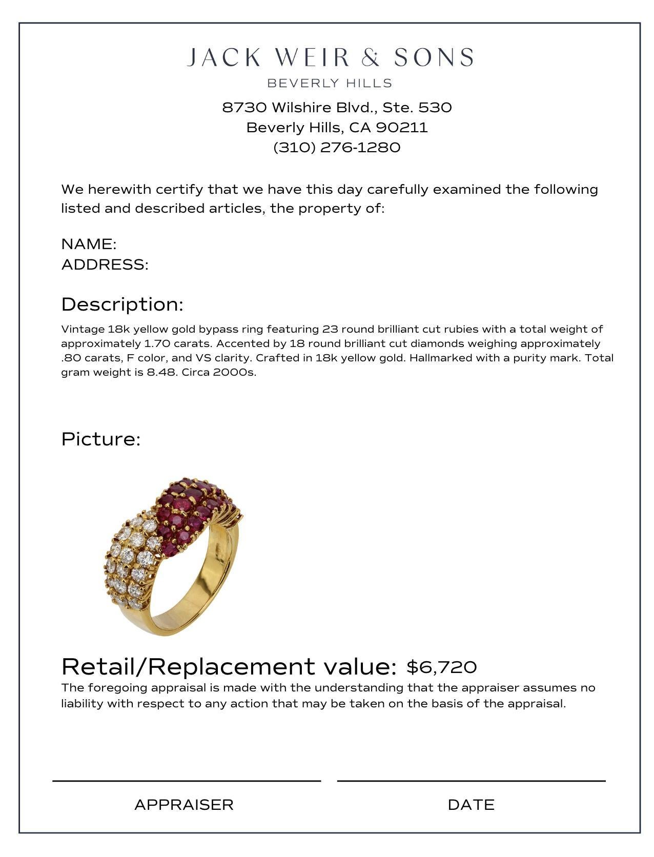 Vintage 2.50 carat ruby and diamond 18k yellow gold bypass ring In Excellent Condition In Beverly Hills, CA